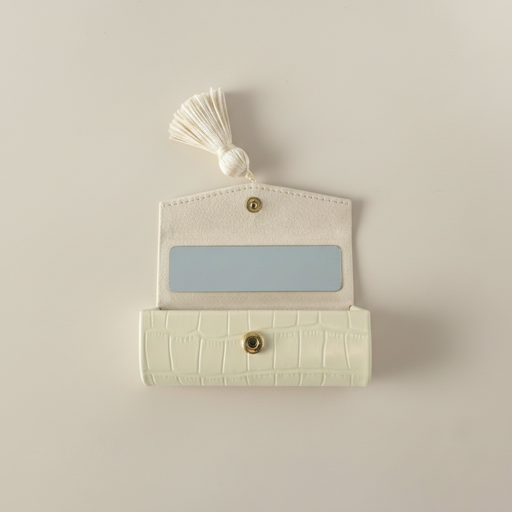Open lipstick case with matched greige background